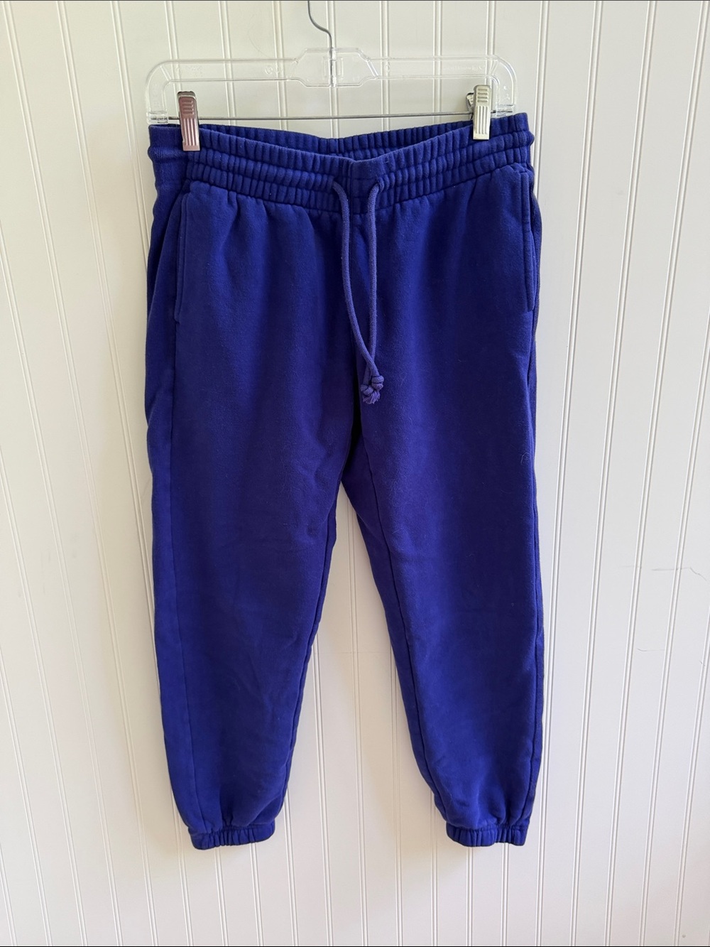 (299)TNA COZYAF Fleece Label on Purple Fabric